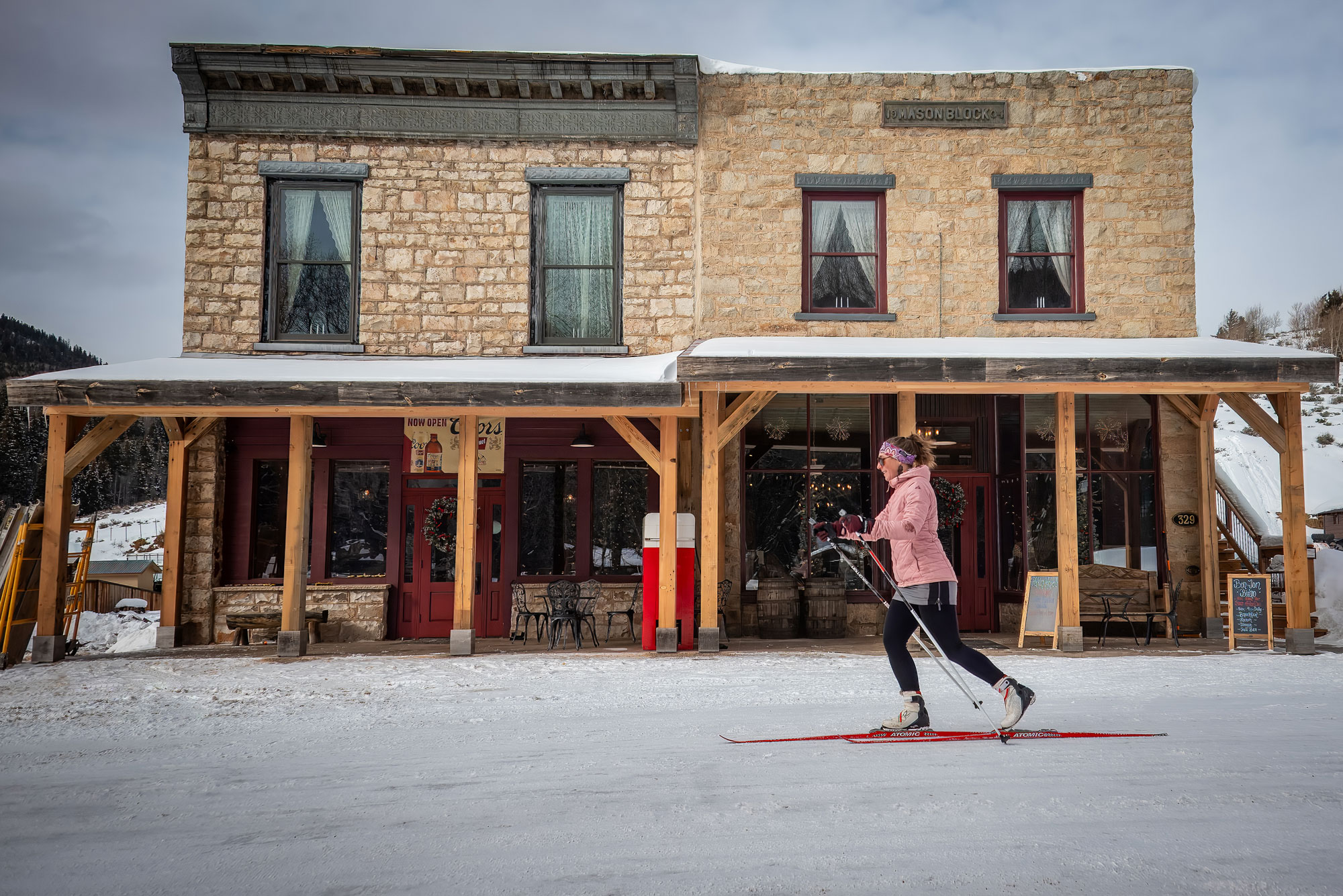 A person cross-country skiing on flat surface in the town of Pitkin, Colorado.